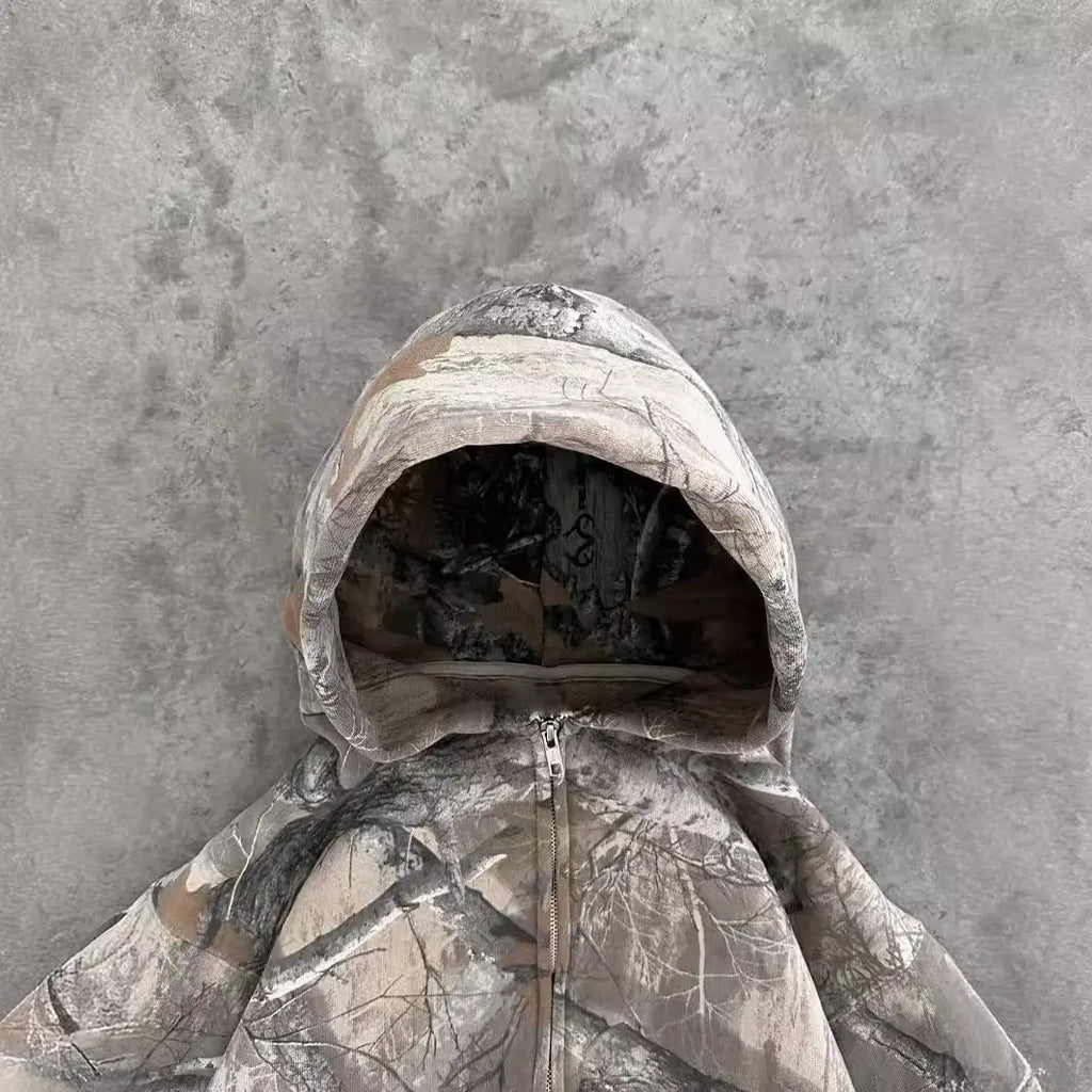 Unisex oversized hoodie with urban camouflage pattern, Kavon retro hip hop style, featuring a hood and casual fit.