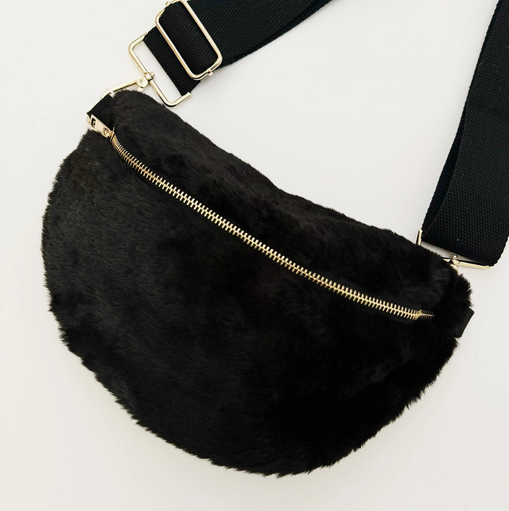 Kavon Buttery Bliss sling bag with golden hardware and custom lining, showcasing its soft leather texture and stylish design.