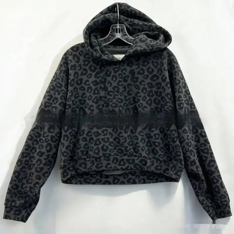 Kavon leopard print vintage hoodie sweatshirt with retro spots, casual and comfortable for everyday wear.