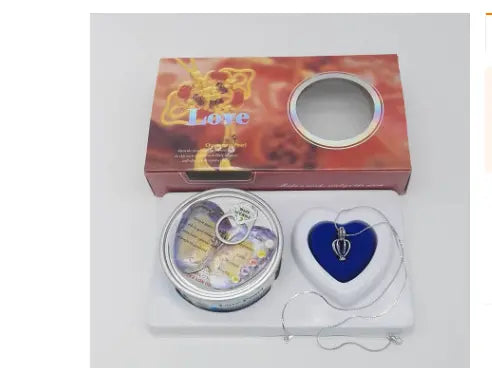 Kavon freshwater pearl necklace gift box set with radiant pearl inside, showcasing elegant jewelry in a sleek presentation box.