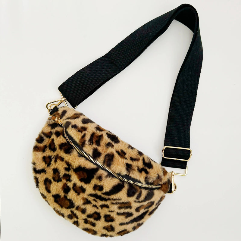 Kavon Buttery Bliss sling bag with golden hardware and custom lining, showcasing its sleek design and luxurious details.