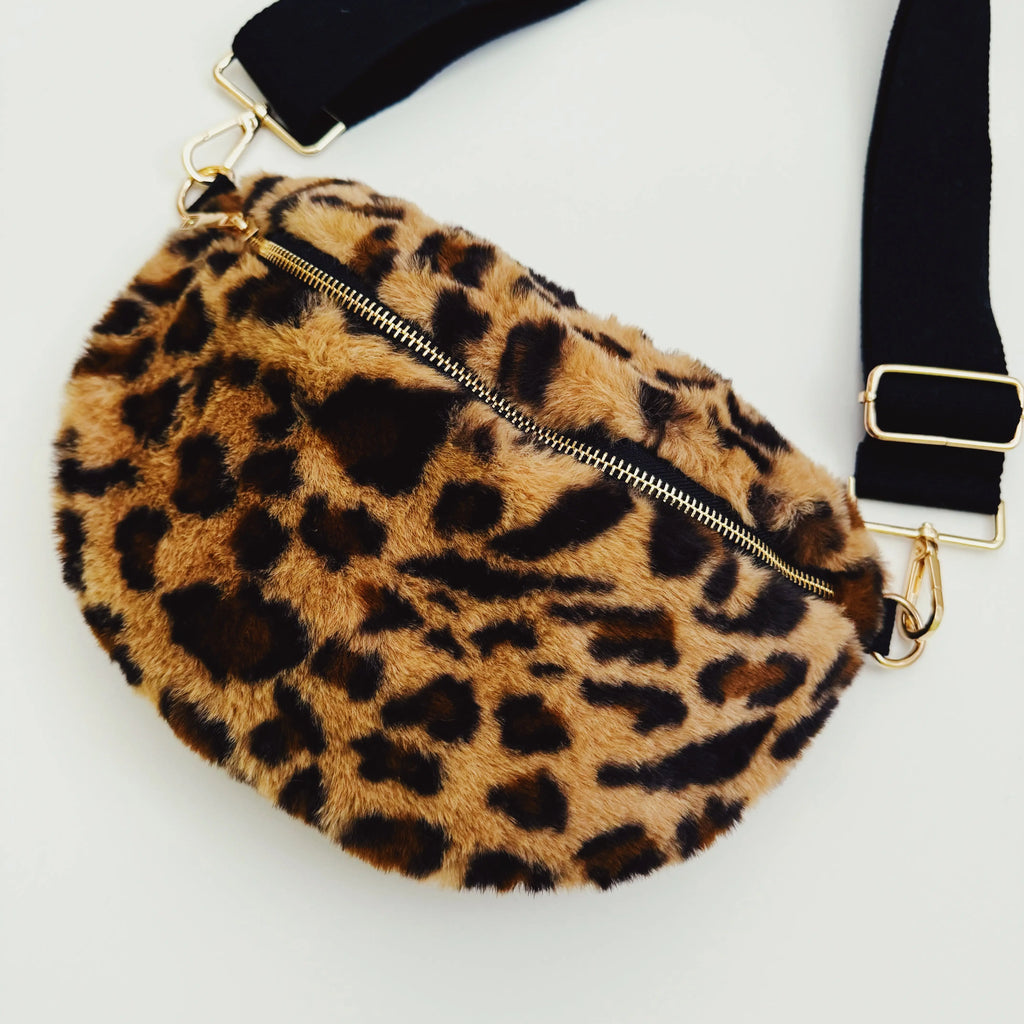 Kavon Buttery Bliss sling bag with golden hardware and custom lining, featuring a sleek, stylish design and compact size.