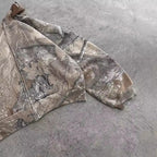 Urban camo unisex oversized hooded sweatshirt by Kavon featuring retro hip hop style and bold camouflage pattern.