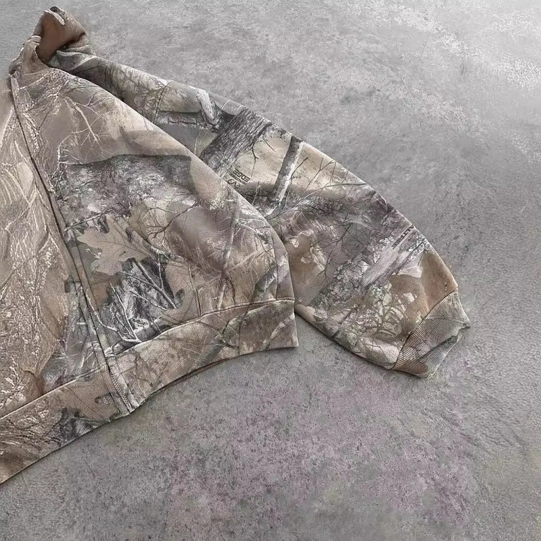 Urban camo unisex oversized hooded sweatshirt by Kavon featuring retro hip hop style and bold camouflage pattern.