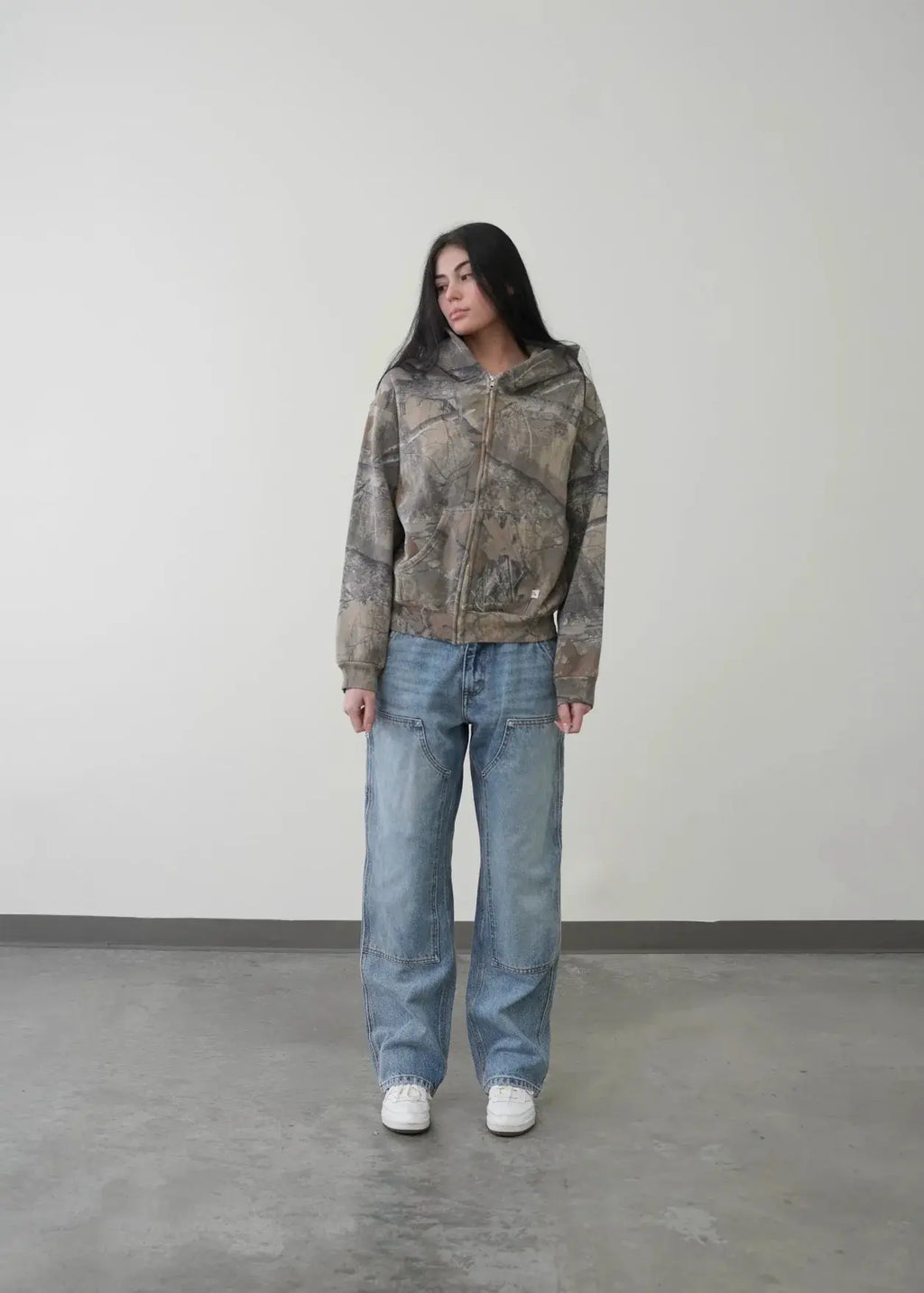 Kavon urban camo unisex oversized hooded sweatshirt with retro hip hop style, featuring a bold camouflage pattern and comfortable fit.