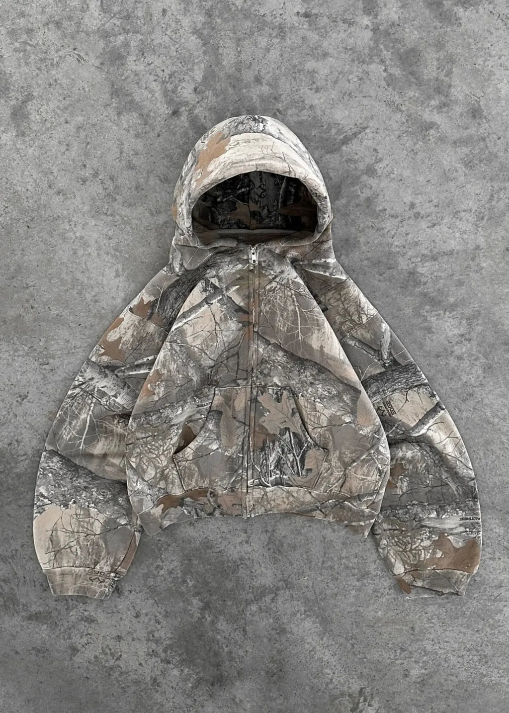 Kavon Urban Camo Unisex Oversized Hooded Sweatshirt with retro hip hop style, featuring bold camouflage pattern and hooded design.