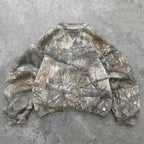 Kavon urban camo oversized unisex hoodie with retro hip hop style, featuring a hood and bold camouflage pattern.
