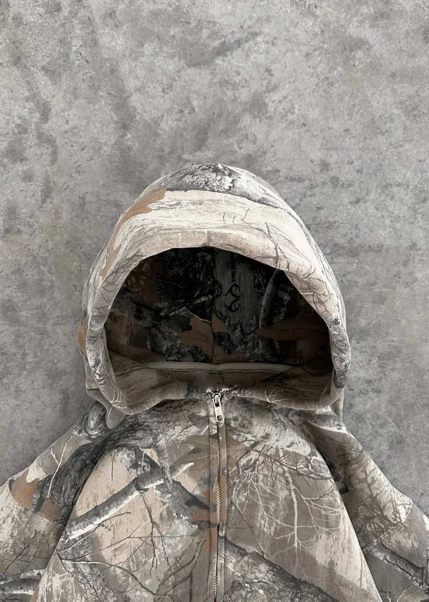 Kavon urban camo unisex oversized hooded sweatshirt with retro hip hop style, featuring a bold camo pattern and large hoodie design.