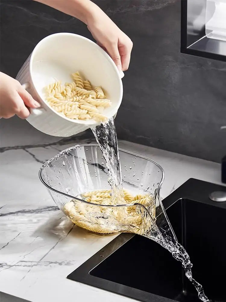 Kavon Heat Guard kitchen drainage basket with handles for quick water drainage and safe handling.