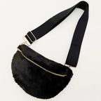 Kavon buttery bliss sling bag with golden hardware and custom lining, featuring a sleek design and stylish compact shape.