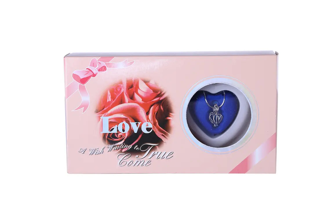 Kavon freshwater pearl necklace gift box set with a radiant pearl inside, elegant jewelry presentation for special occasions.