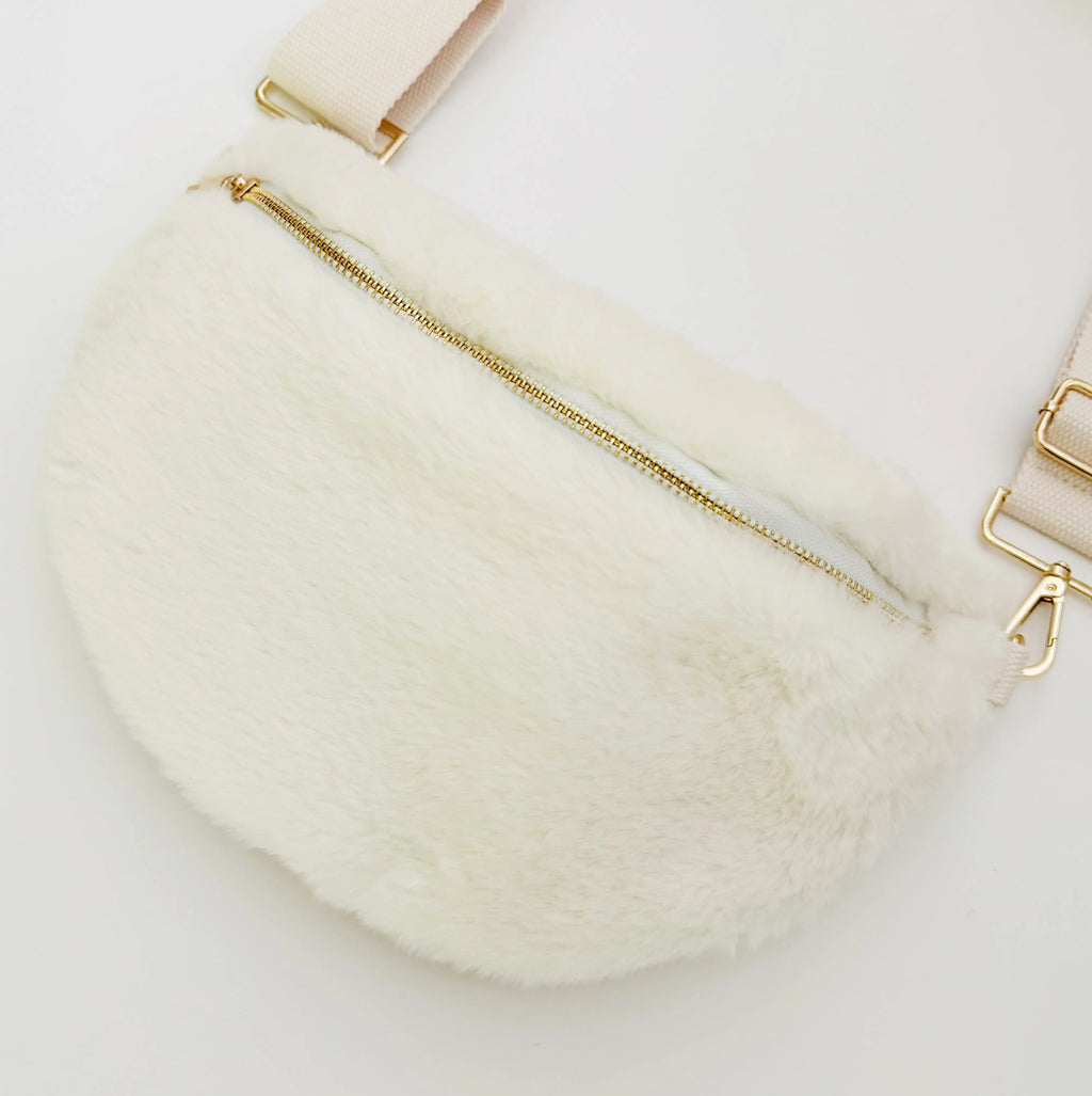 Kavon Buttery Bliss sling bag with golden hardware and custom lining, showcasing its elegant design and luxurious leather texture.