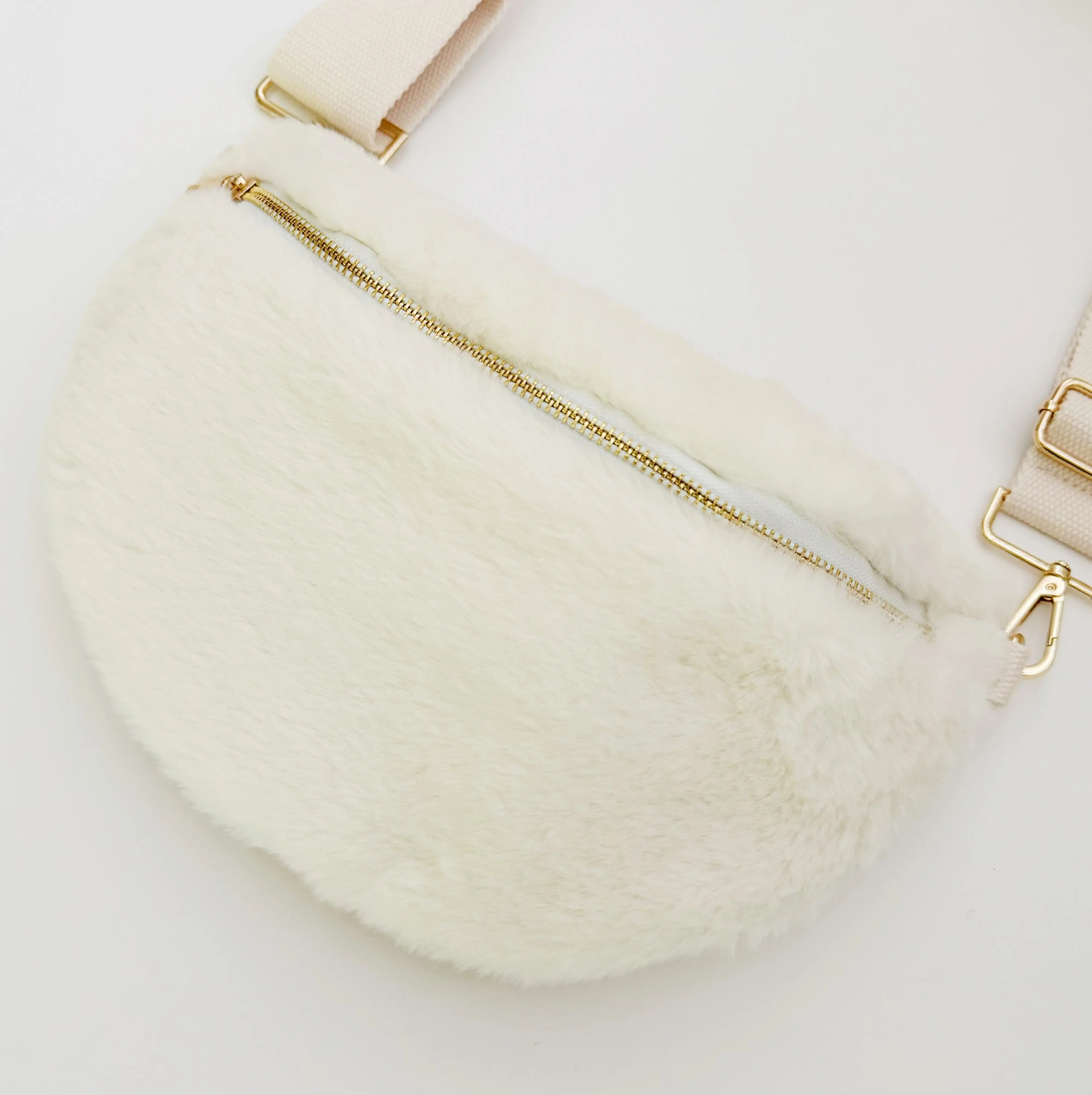 Kavon Buttery Bliss sling bag with golden hardware and custom lining, showcasing its elegant design and luxurious leather texture.