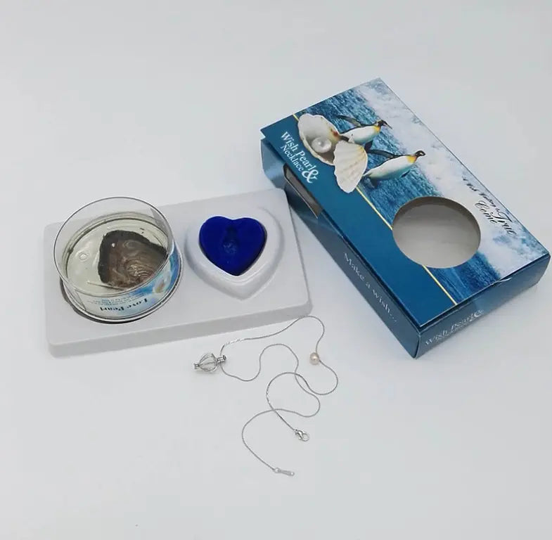 Kavon freshwater pearl necklace set with a radiant pearl inside a gift box, showcasing elegant jewelry presentation.